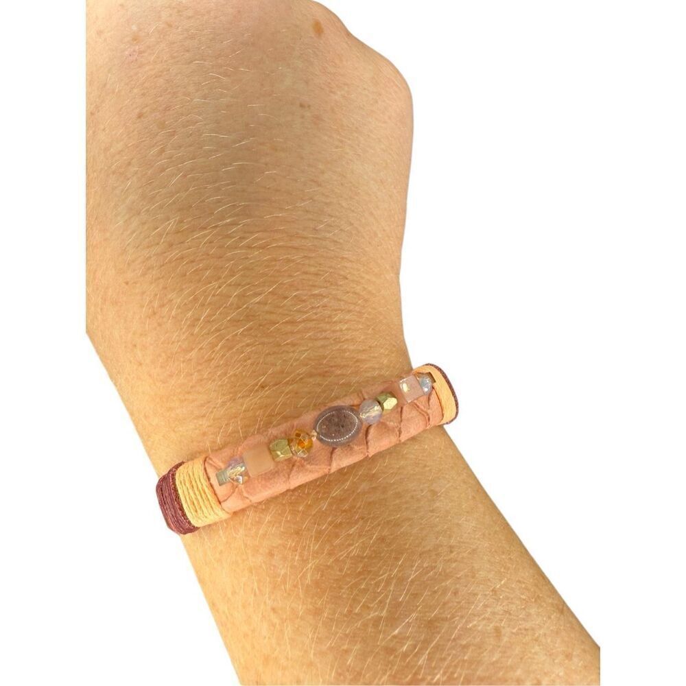 Boutique gold cuff with thread detail